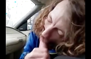 sucking my helpmate in car after a hanker day