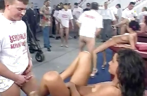 Public sex orgy with respect to hot babes in a huge warehouse